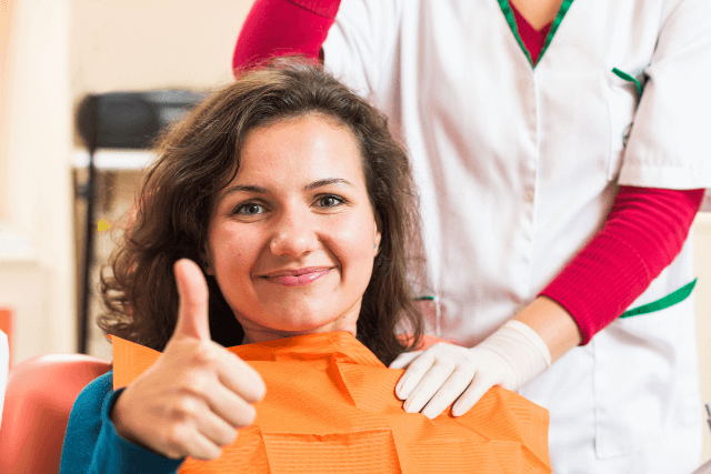 Post-treatment patient showing relief after laser therapy for cysts, fistulas, or hemorrhoids.